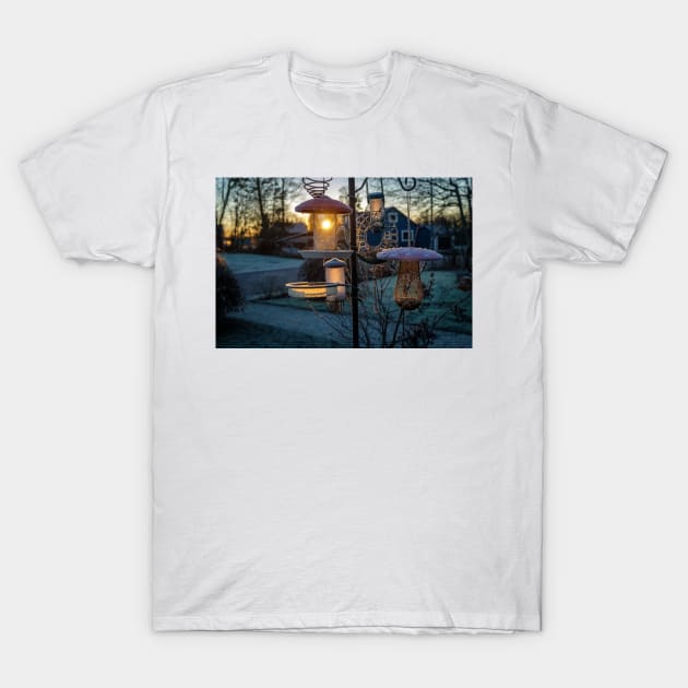 the birds are not yet up, when the beautiful sunrise that shines on the birds dining table T-Shirt by connyM-Sweden